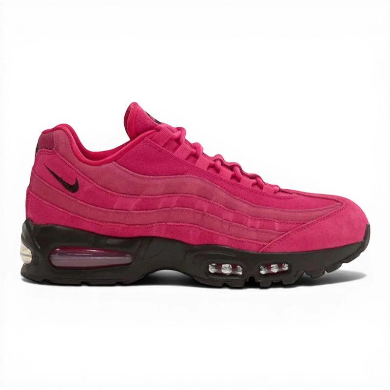 Nike Air Max 95 in Fireberry colorway featuring suede upper with black accents and visible Air cushioning.