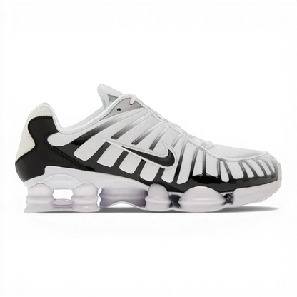 Nike Shox TL White/Black-Metallic Platinum athletic shoes with breathable mesh and TPU overlays for support.